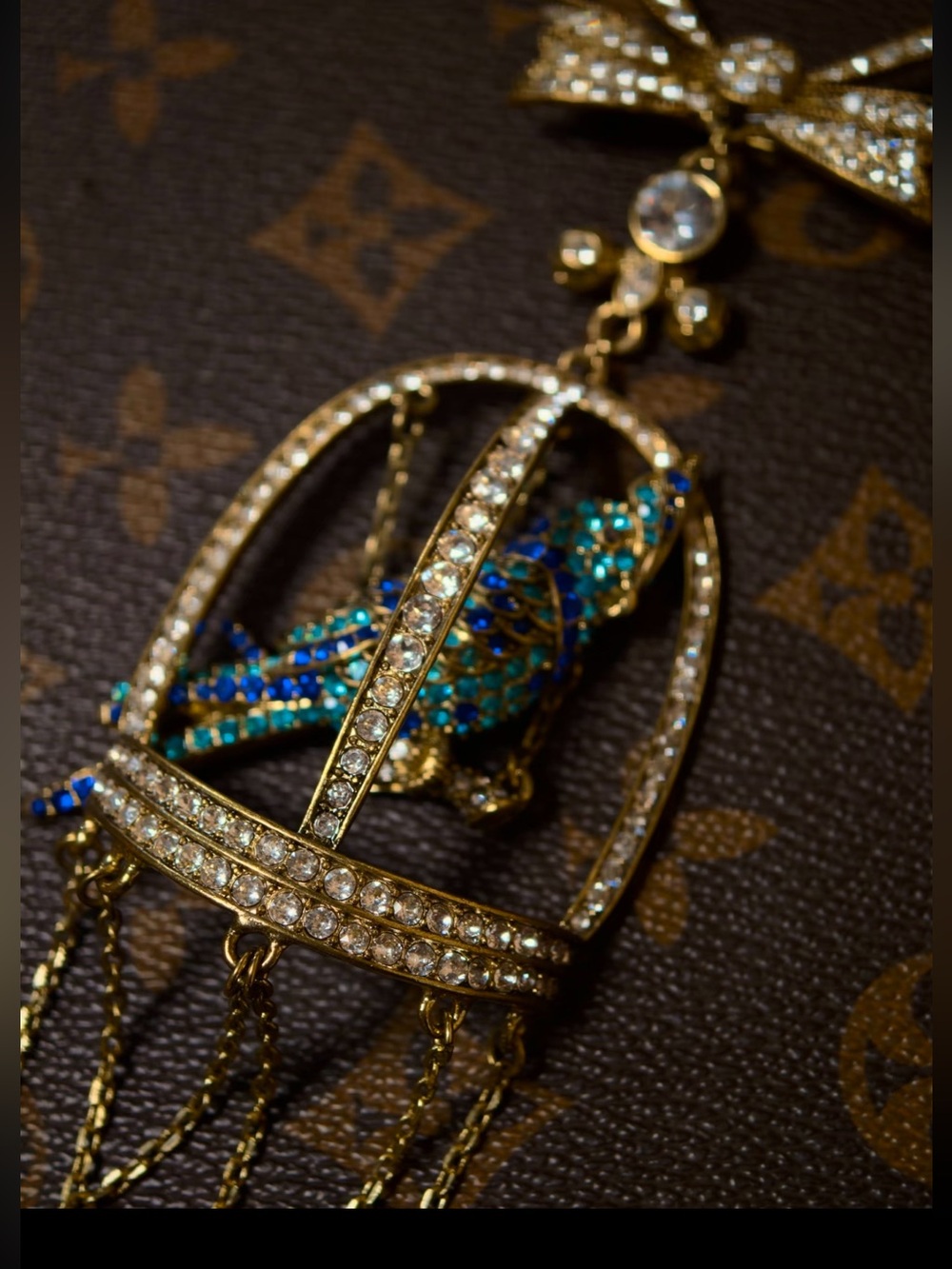 MaxMara Gold-Tone Birdcage Pendant Necklace with Blue and Teal Crystal Bird